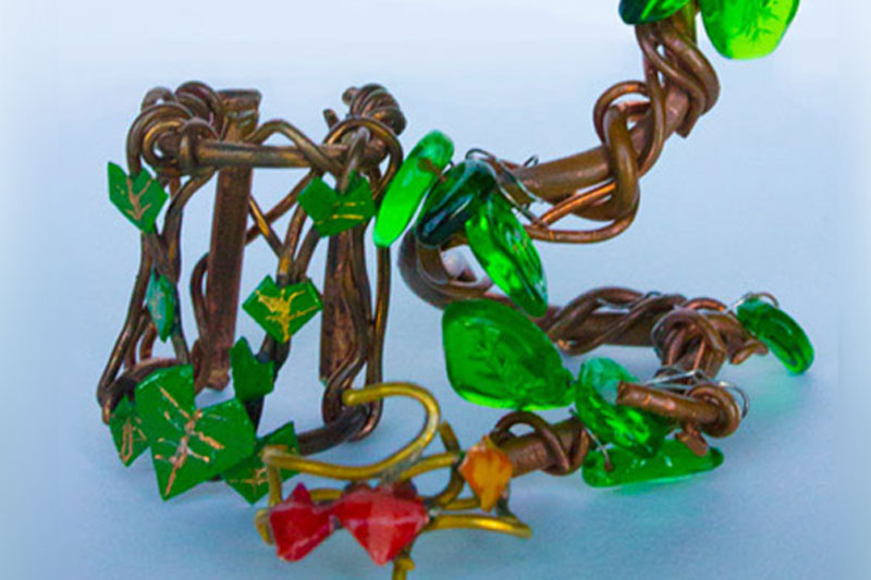 A series of three in a study of different ways rings can go around the finger. Primarily influenced by nature, trees and vines in particular.